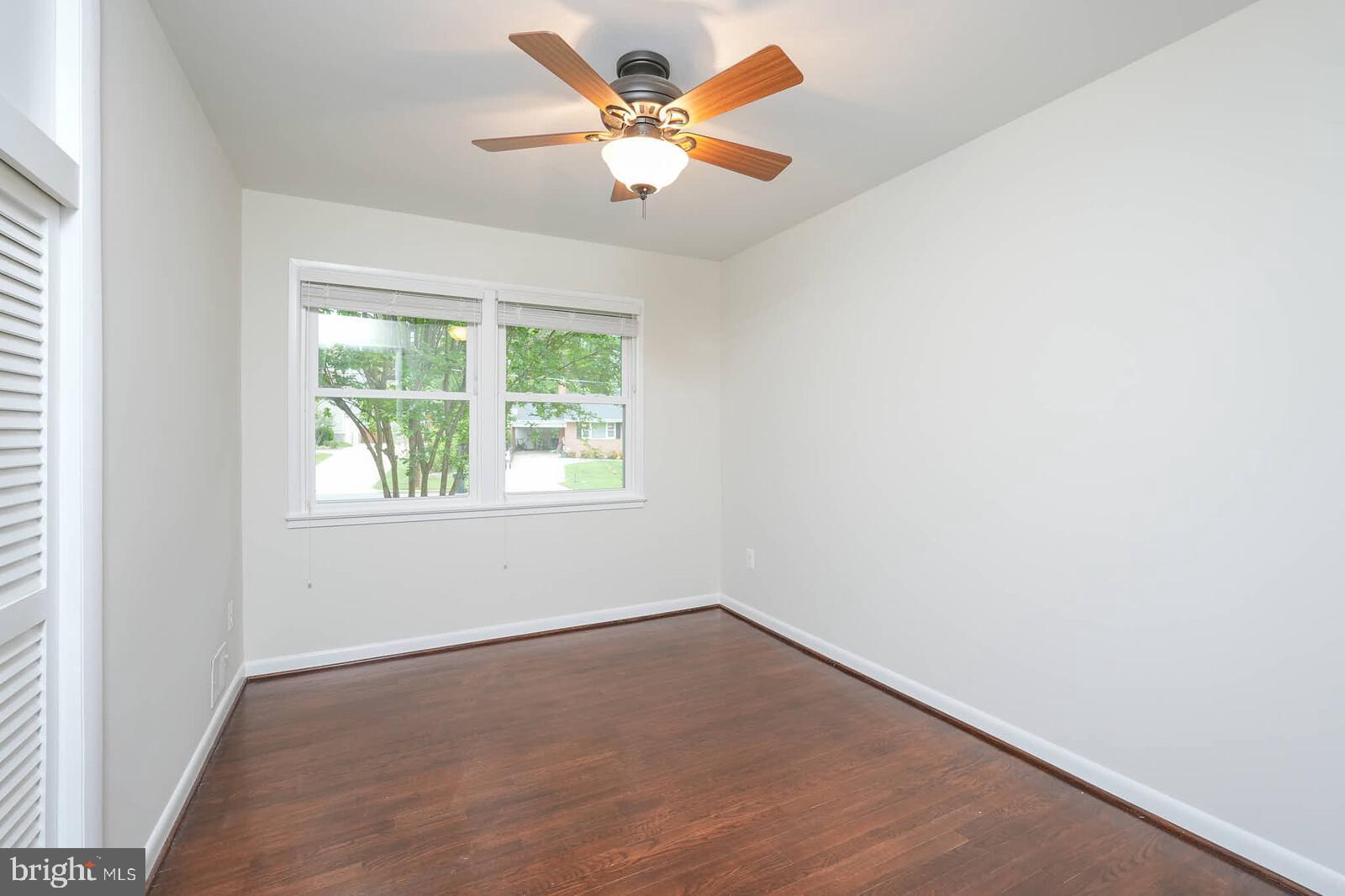 6511 Engel Drive McLean, VA 22101 - Photo 26 of 56 an empty room with a window and a fan