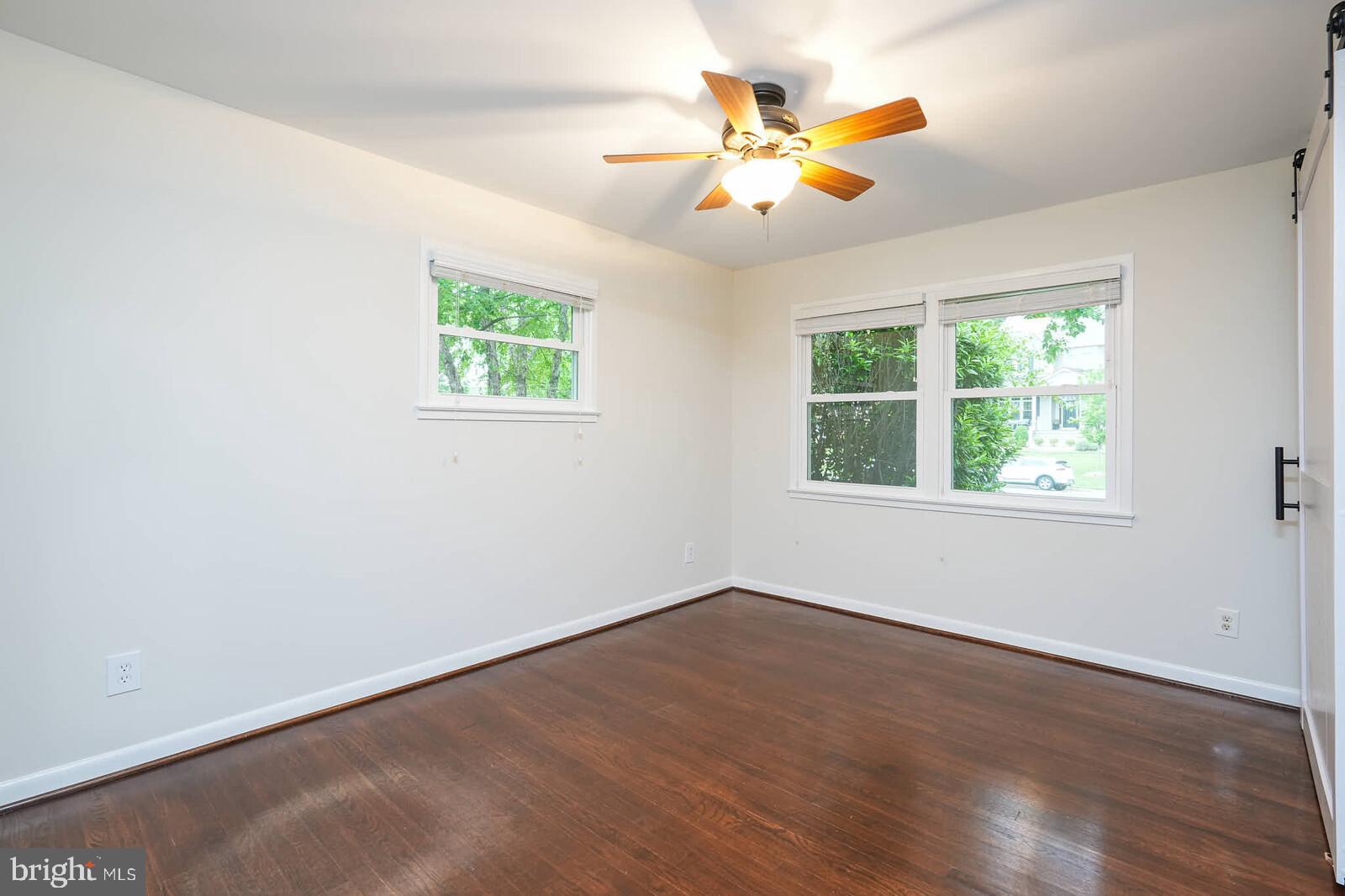 6511 Engel Drive McLean, VA 22101 - Photo 28 of 56 an empty room with window and ceiling fan