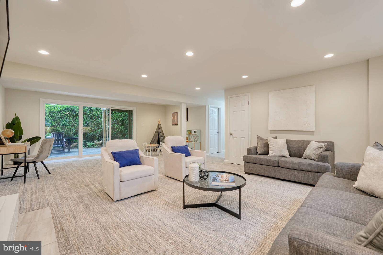 6511 Engel Drive McLean, VA 22101 - Photo 36 of 56 a living room with furniture and a large window