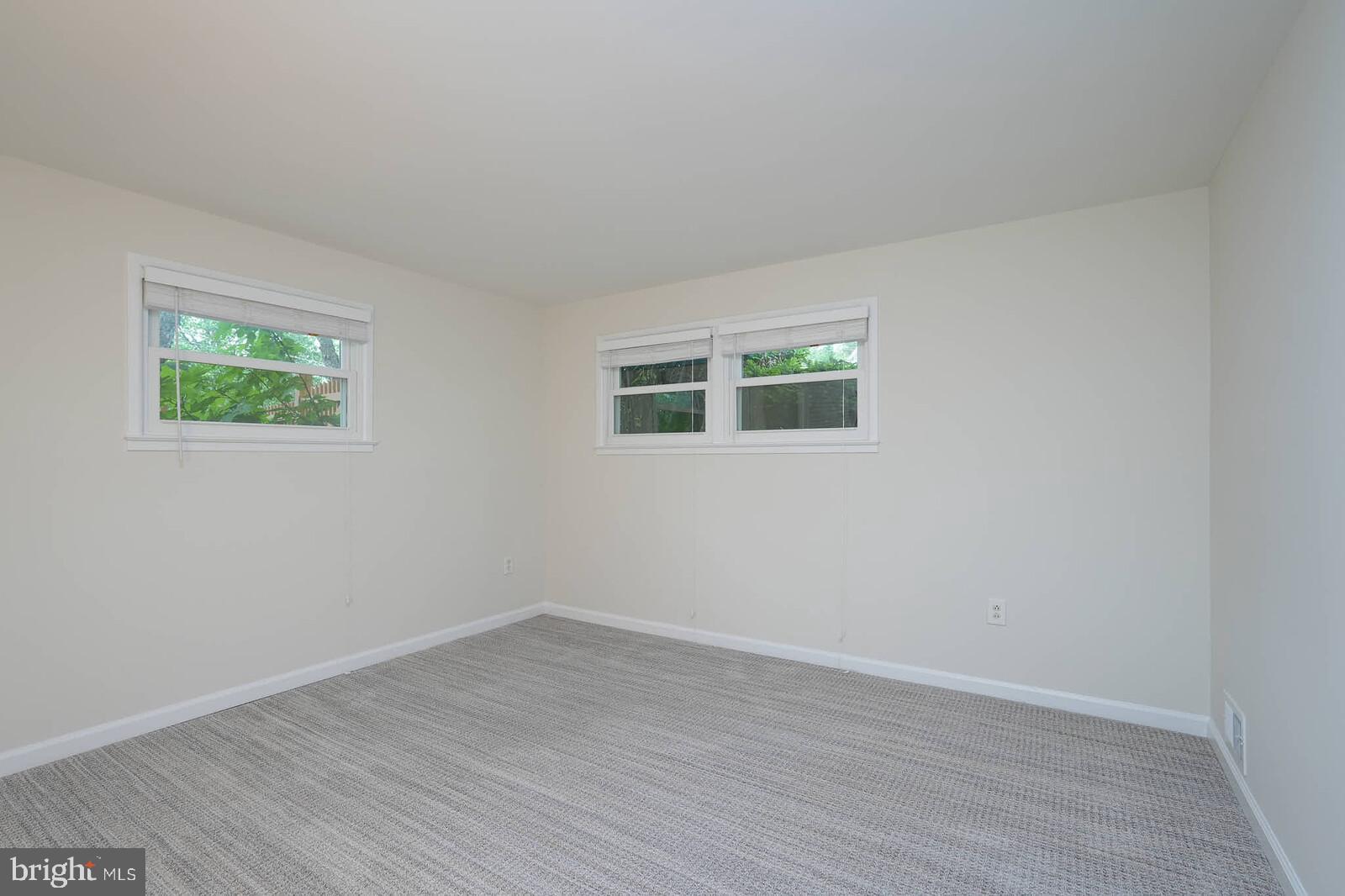6511 Engel Drive McLean, VA 22101 - Photo 41 of 56 a view of an empty room with wooden floor and a window