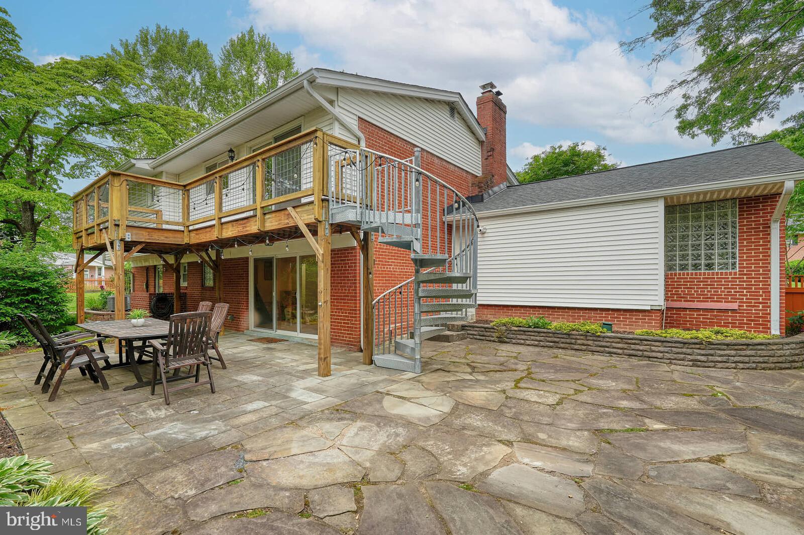 6511 Engel Drive McLean, VA 22101 - Photo 44 of 56 a view of a house with backyard and sitting area