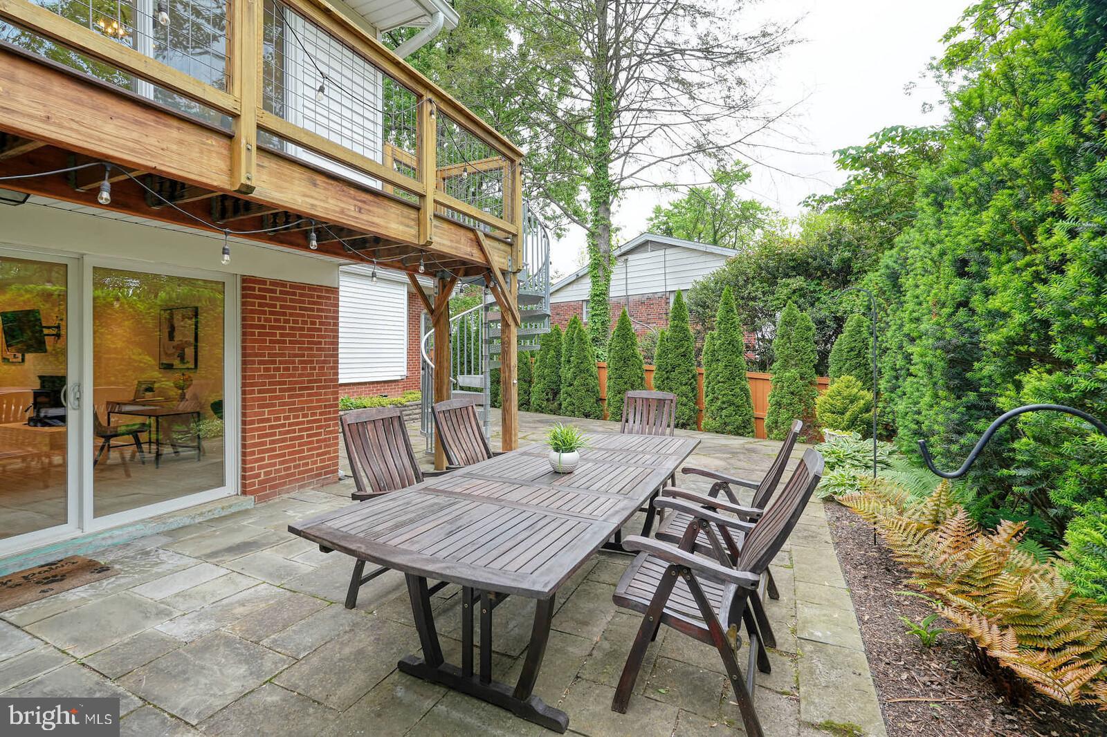 6511 Engel Drive McLean, VA 22101 - Photo 45 of 56 a view of a patio with a table and chairs