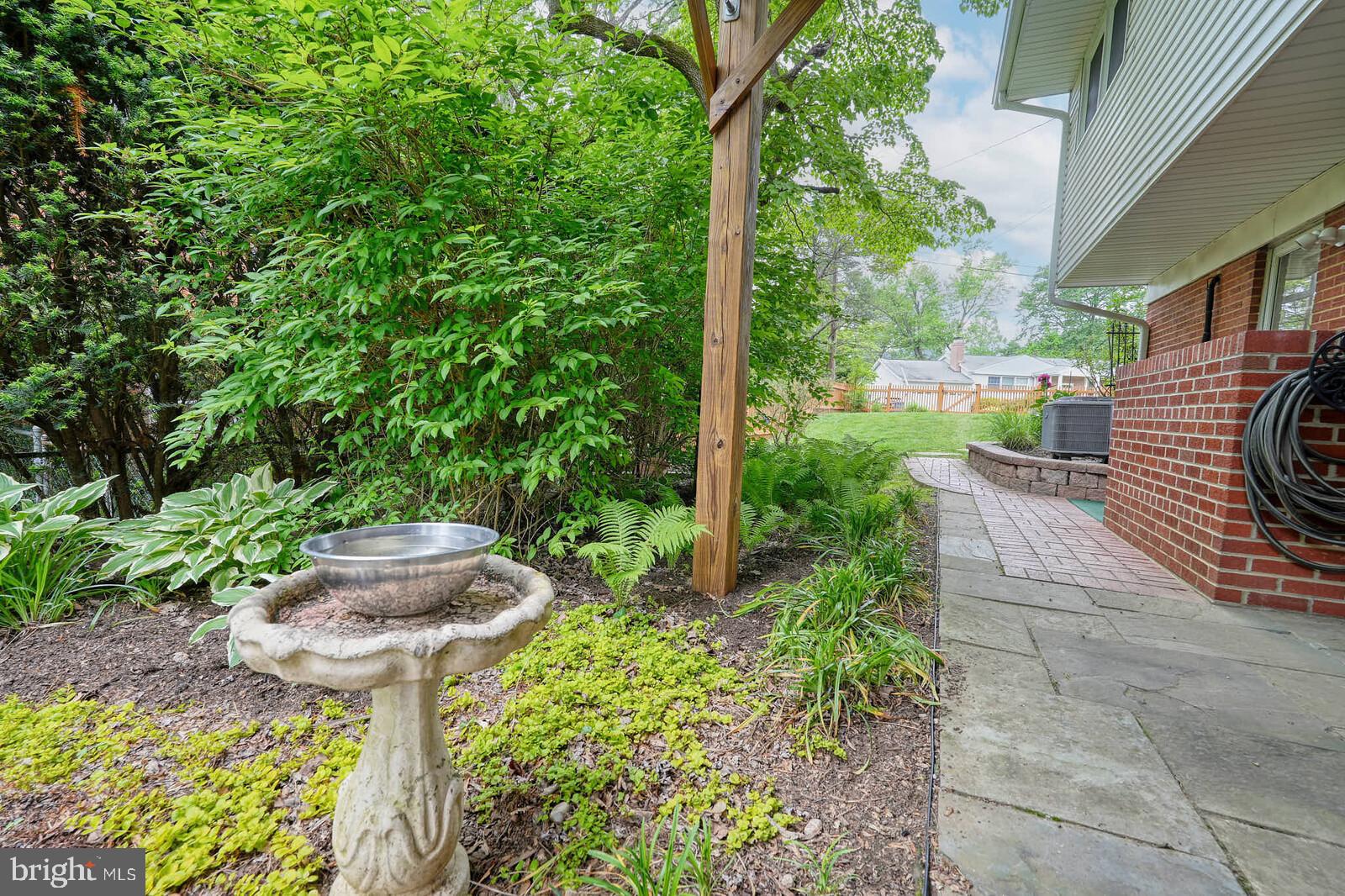 6511 Engel Drive McLean, VA 22101 - Photo 48 of 56 a view of a garden with potted plants