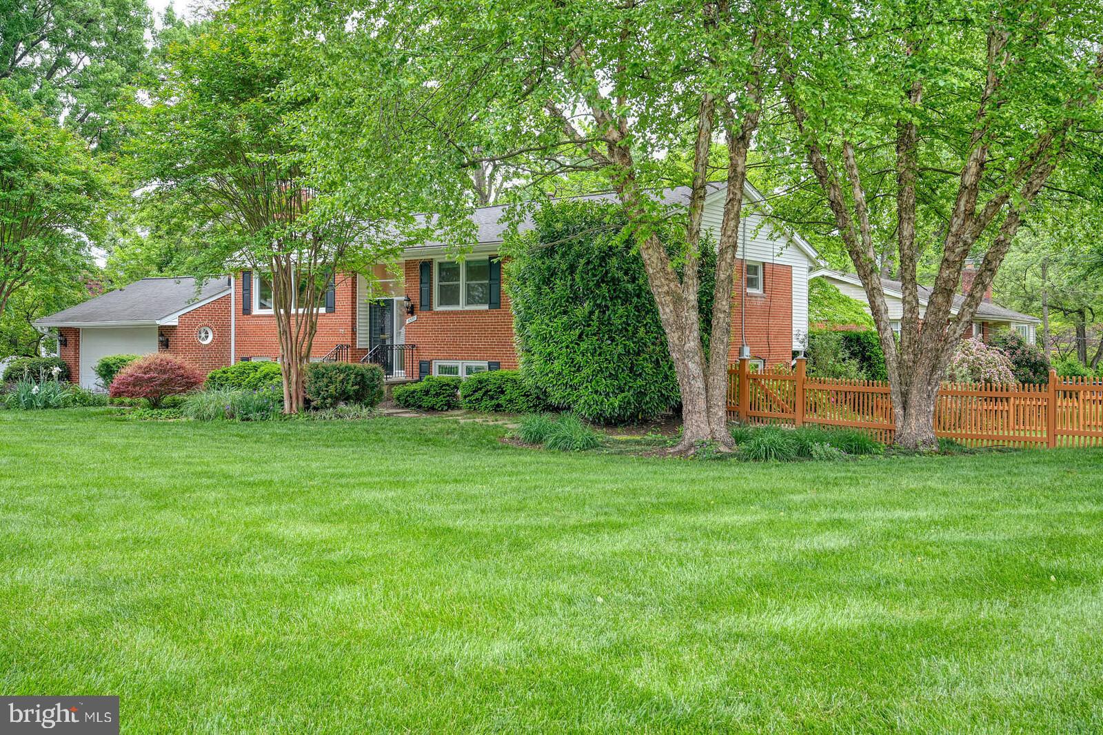 6511 Engel Drive McLean, VA 22101 - Photo 5 of 56 a front view of a house with garden