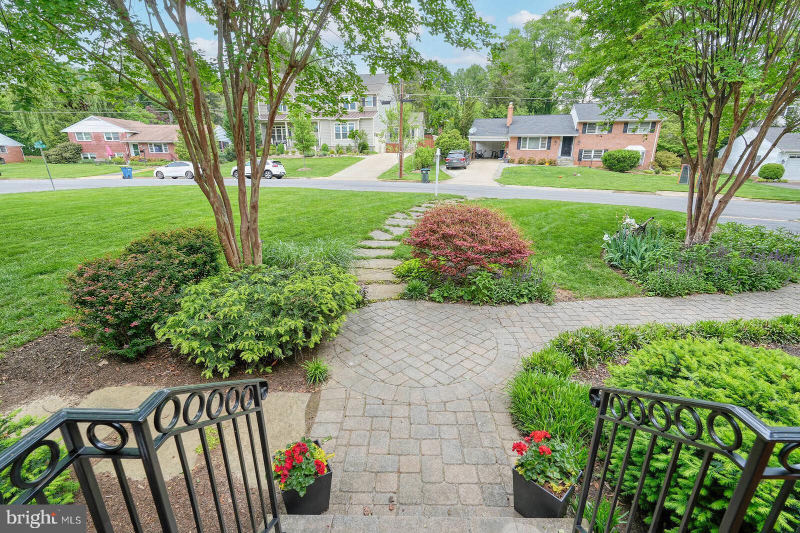 6511 Engel Drive McLean, VA 22101 - Photo 8 of 56 a front view of a house with a yard