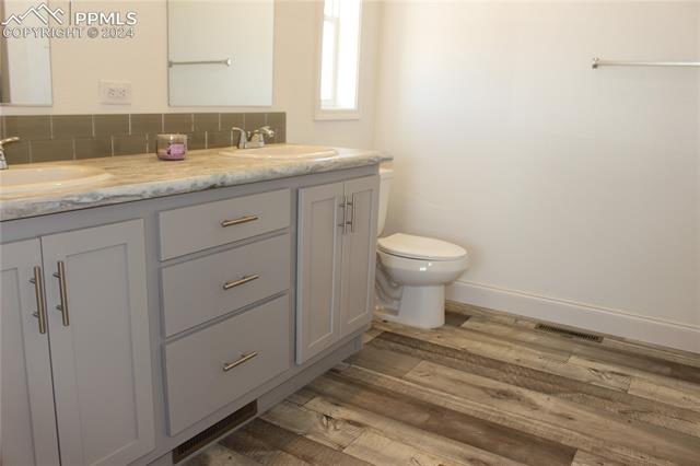 40391 Gieck Road Rush, CO 80833 - Photo 15 of 17 Bathroom featuring double sink vanity