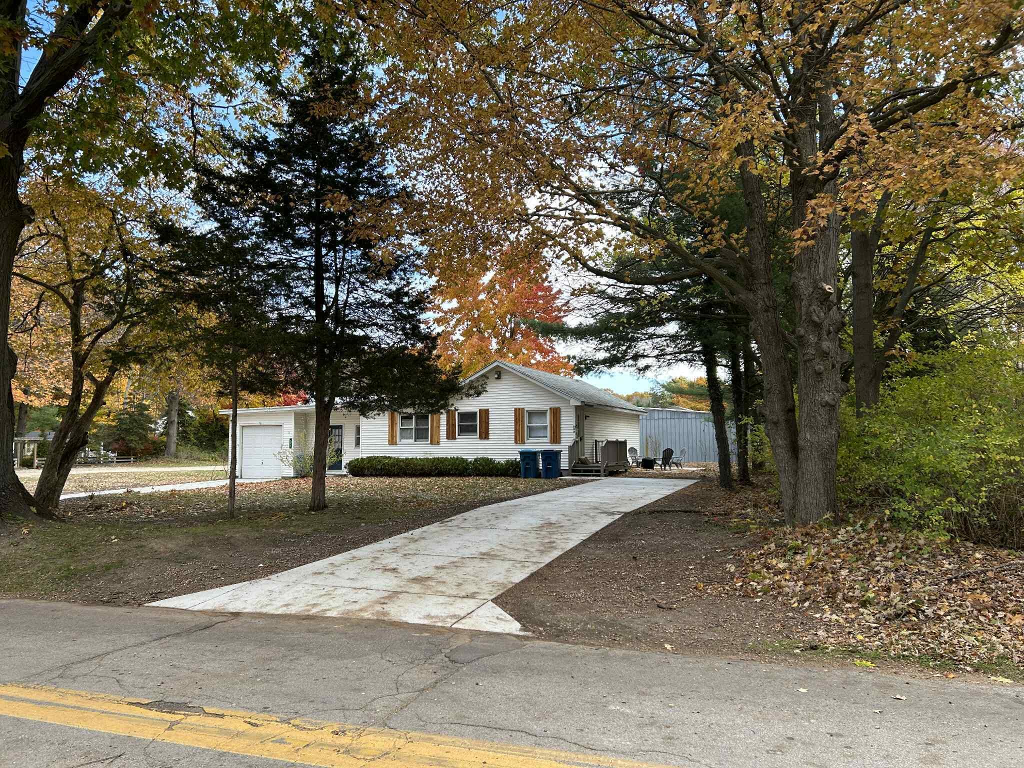 707 North Maple Street Saugatuck, MI 49453 - Photo 29 of 29 Updated Exterior