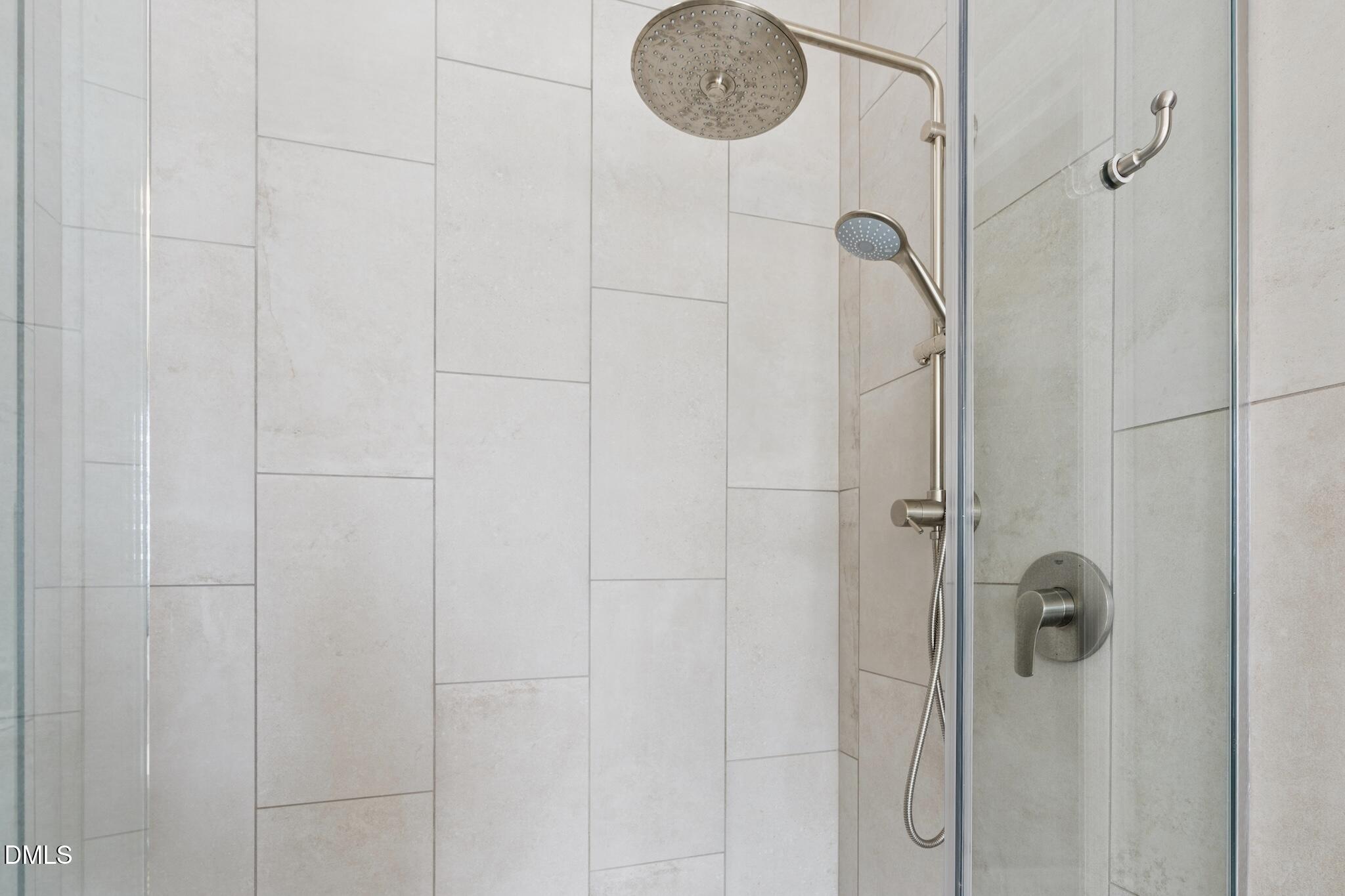 7340 Shady Stroll Lane Willow Spring, NC 27592 - Photo 33 of 67 a bathroom with a shower