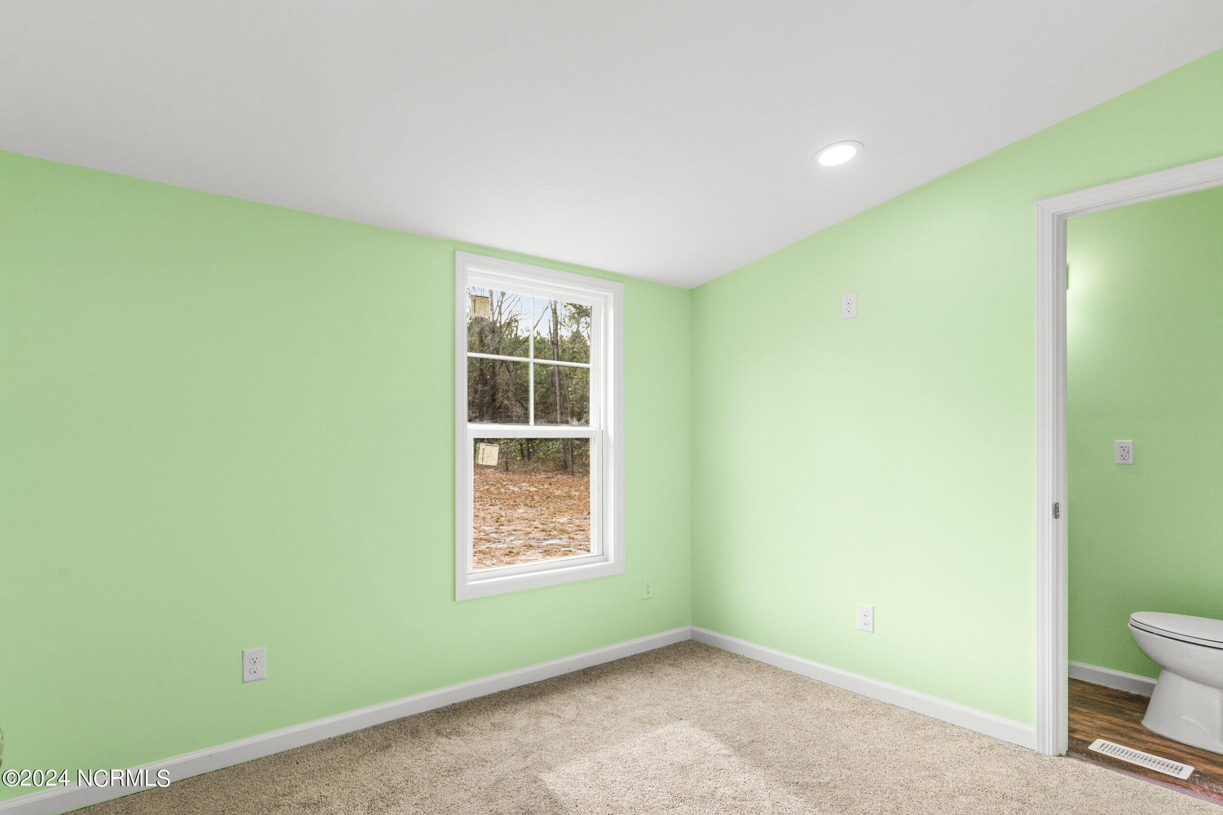 168 Stocking Head Road Rose Hill, NC 28458 - Photo 18 of 40 Bedroom with bathroom