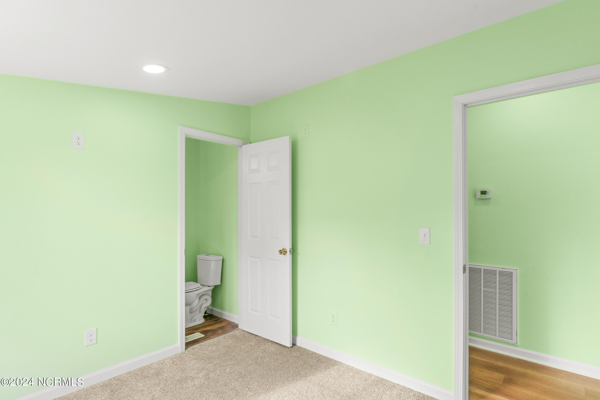 168 Stocking Head Road Rose Hill, NC 28458 - Photo 19 of 40 Bedroom with Bathroom