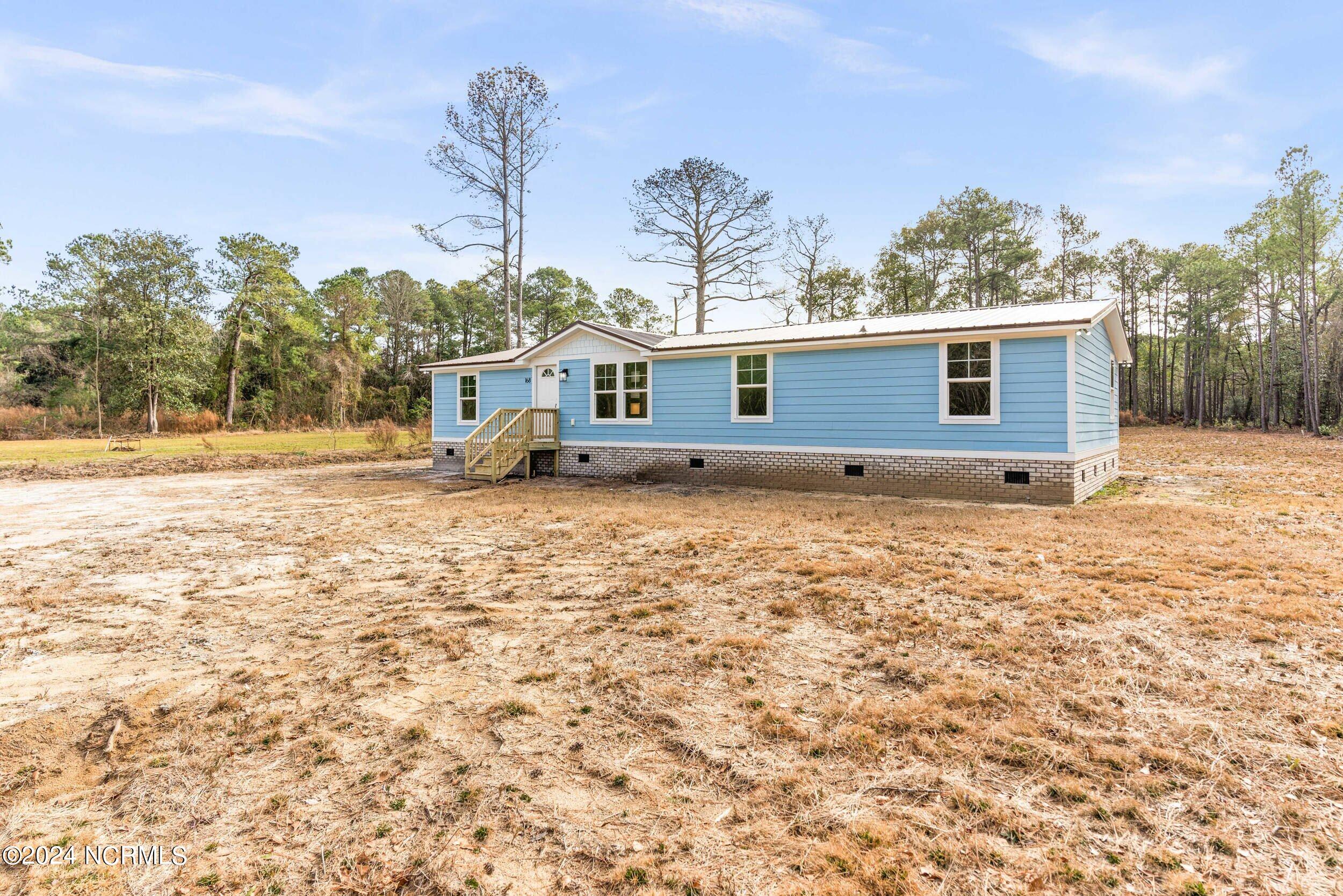 168 Stocking Head Road Rose Hill, NC 28458 - Photo 2 of 40 168stockingheadrd_00012