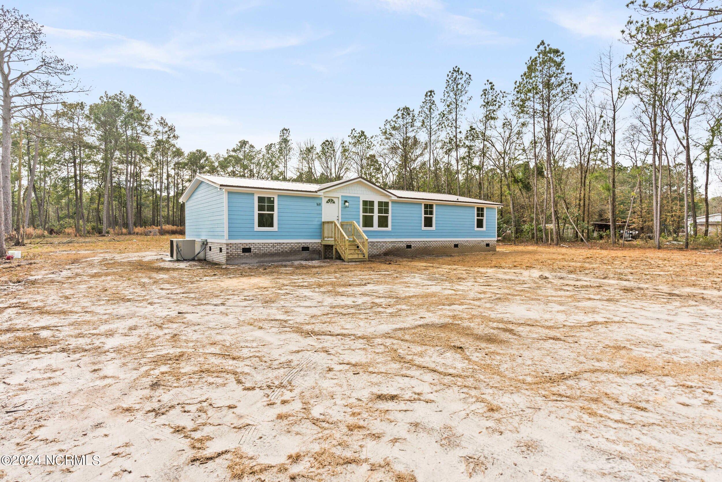 168 Stocking Head Road Rose Hill, NC 28458 - Photo 3 of 40 168stockingheadrd_00013