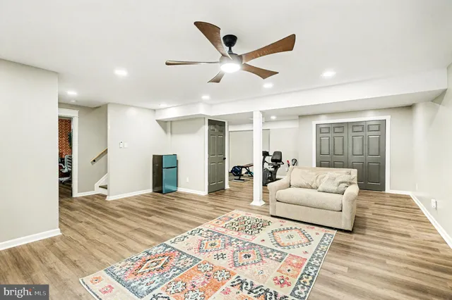 a living room with furniture and window