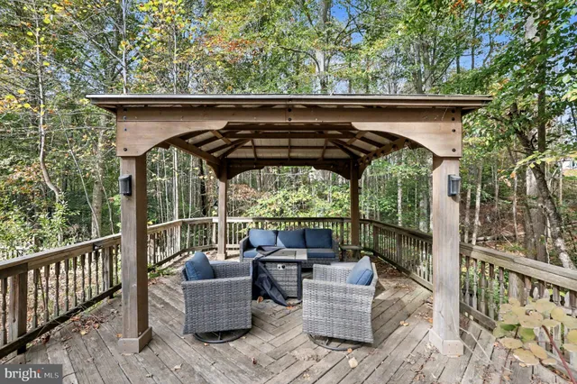 a patio with furniture and garden