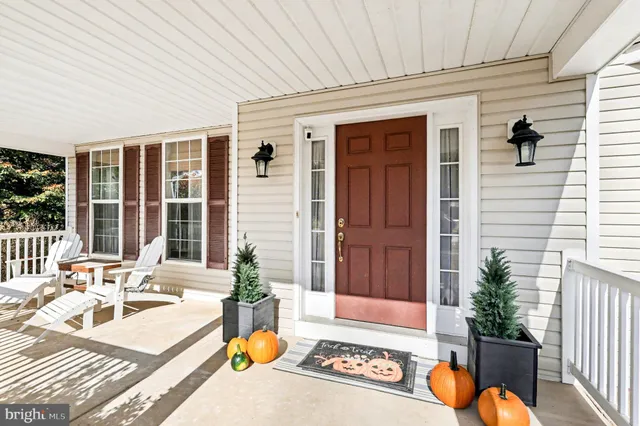 a view of swimming pool with outdoor seating
