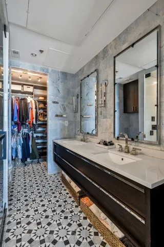 a living room with furniture a rug and a window