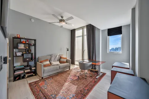 a view of a workspace with furniture