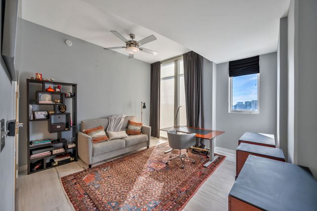 a view of a workspace with furniture