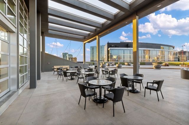 a view of a chairs and tables in patio