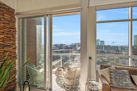 a view of a glass door and porch