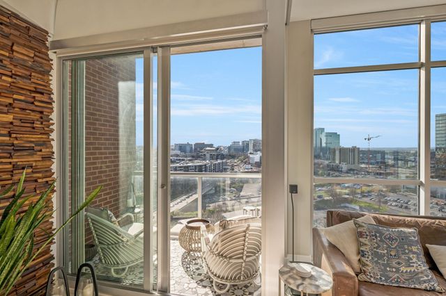a view of a glass door and porch