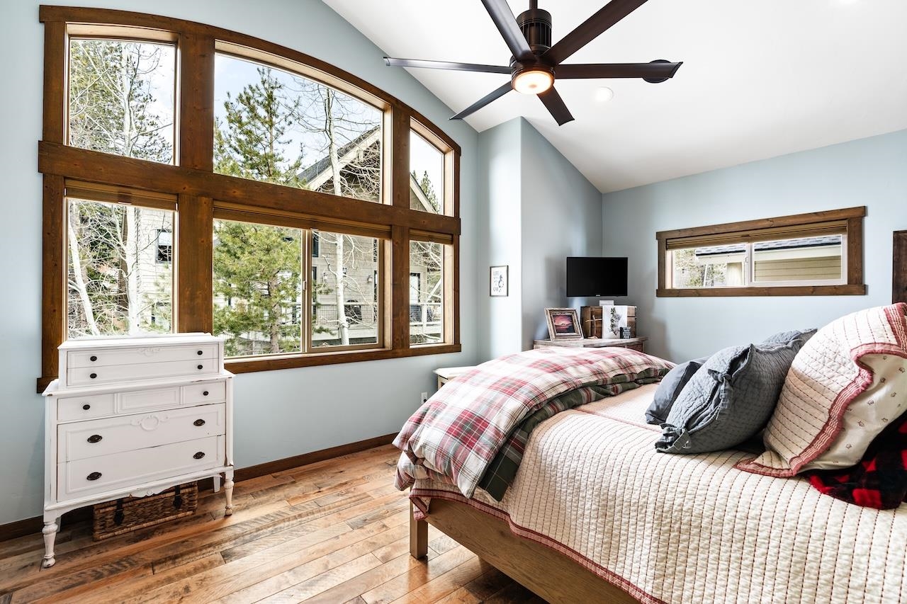12719 Northwoods Boulevard Truckee, CA 96161 - Photo 14 of 28 a bedroom with a bed and a window
