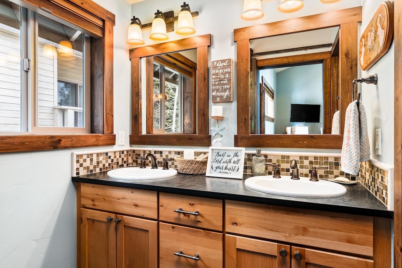 12719 Northwoods Boulevard Truckee, CA 96161 - Photo 15 of 28 a bathroom with a sink and a mirror