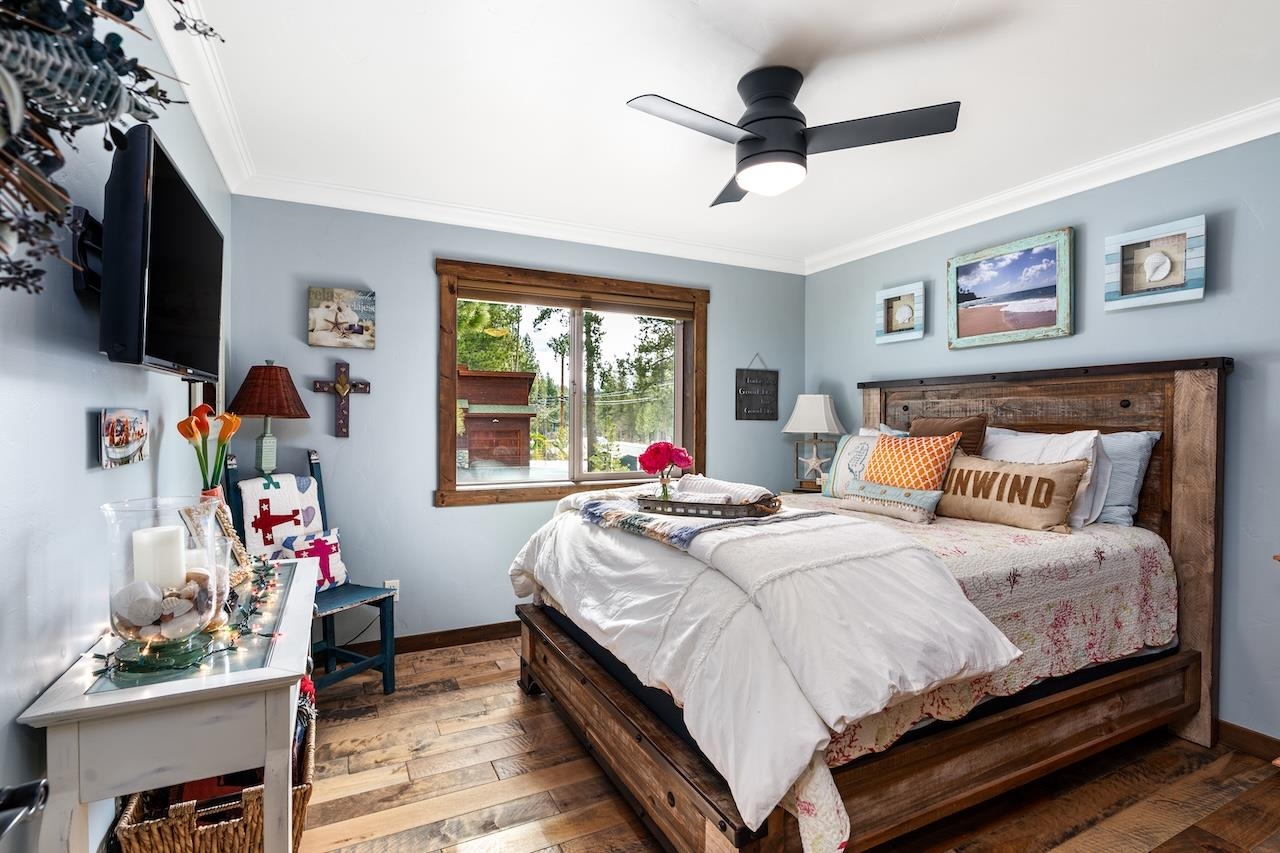 12719 Northwoods Boulevard Truckee, CA 96161 - Photo 17 of 28 a bedroom with a bed and a flat screen tv