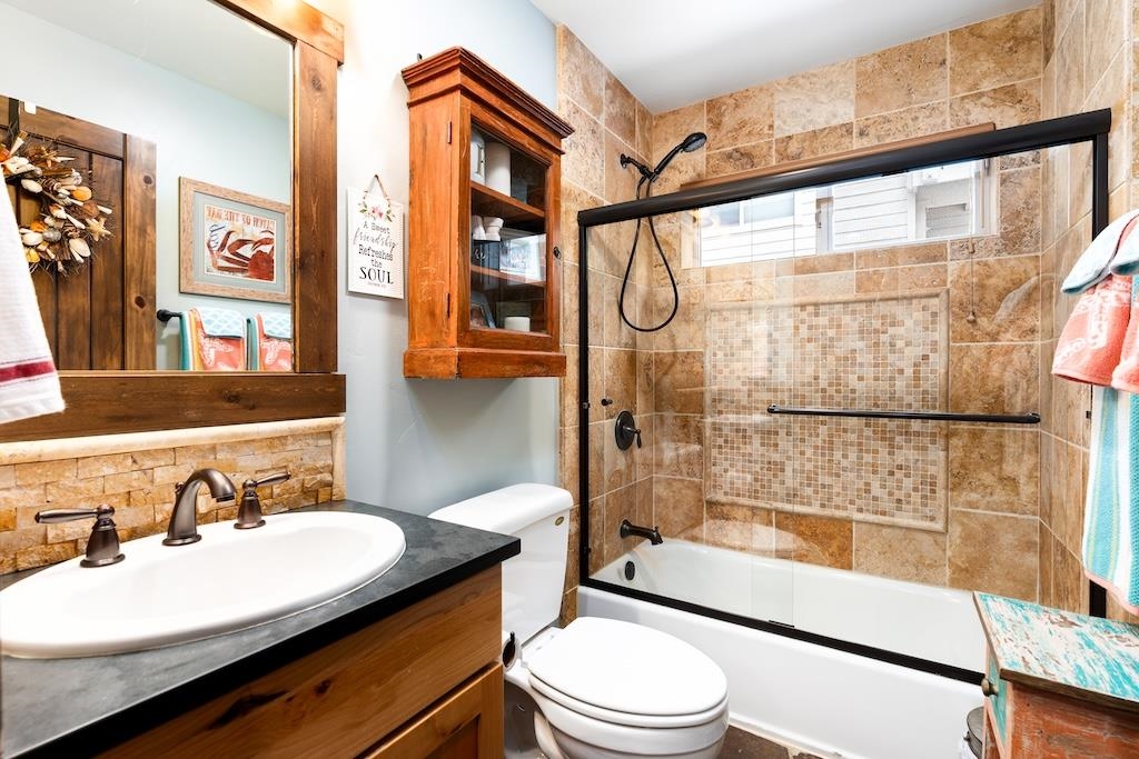 12719 Northwoods Boulevard Truckee, CA 96161 - Photo 18 of 28 a bathroom with a sink a toilet and shower