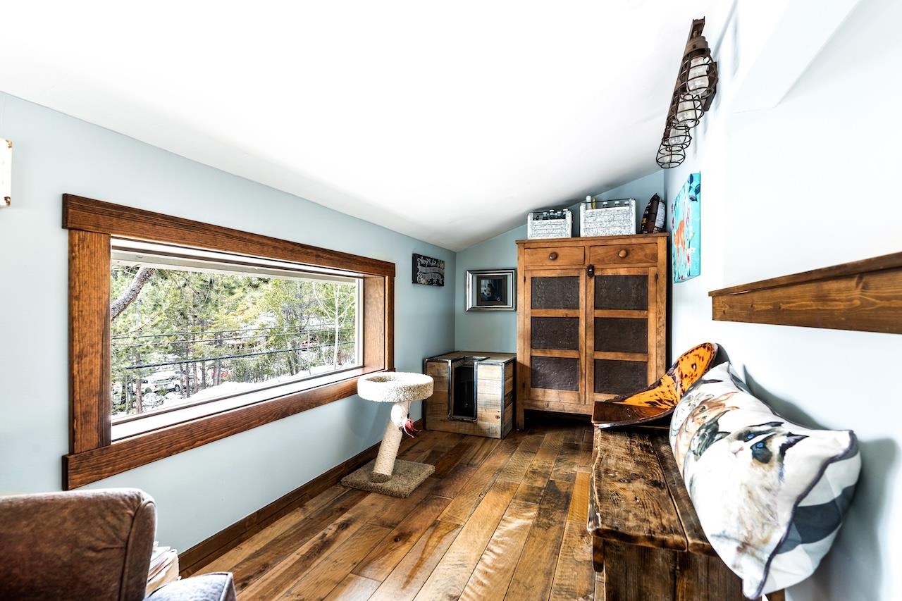 12719 Northwoods Boulevard Truckee, CA 96161 - Photo 20 of 28 a bedroom with furniture and a window