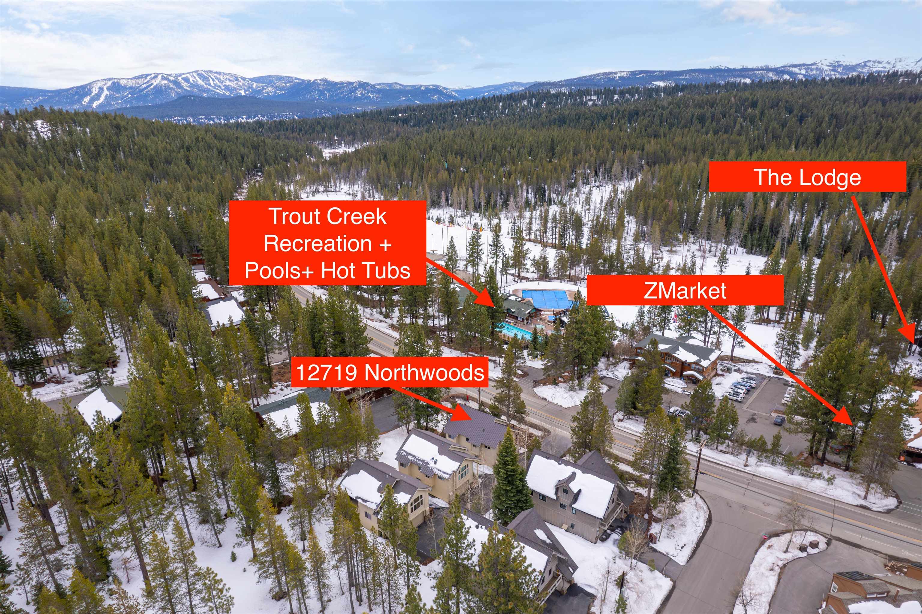 12719 Northwoods Boulevard Truckee, CA 96161 - Photo 3 of 28 a view of swimming pool with a table chairs and a lake view