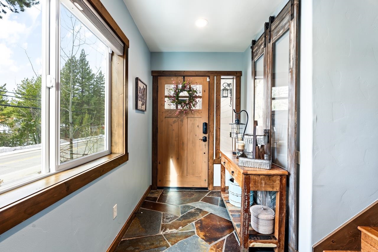 12719 Northwoods Boulevard Truckee, CA 96161 - Photo 4 of 28 a view of an entryway with wooden floor and windows