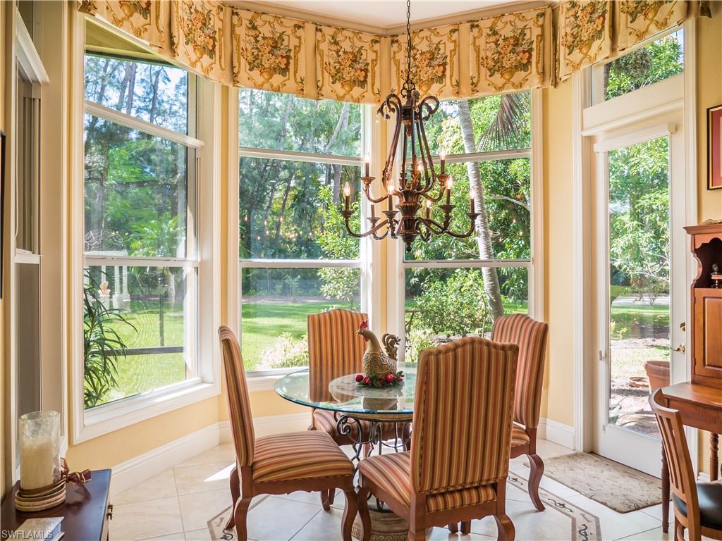 136 Hickory Road Naples, FL 34108 - Photo 15 of 34 Eat-in kitchen overlooks the backyard.