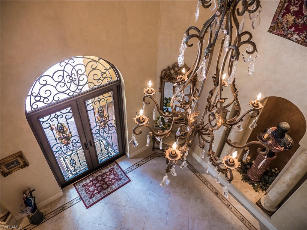 136 Hickory Road Naples, FL 34108 - Photo 23 of 34 View of the entry foyer from the second floor landing area.