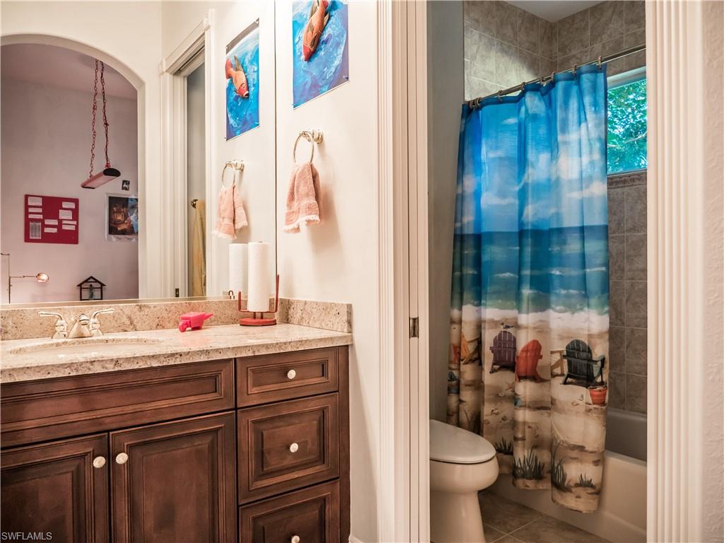 136 Hickory Road Naples, FL 34108 - Photo 25 of 34 Full bath off the arts room.