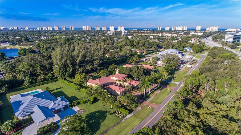 136 Hickory Road Naples, FL 34108 - Photo 3 of 34 Aerial of the residence and immediate neighborhood.