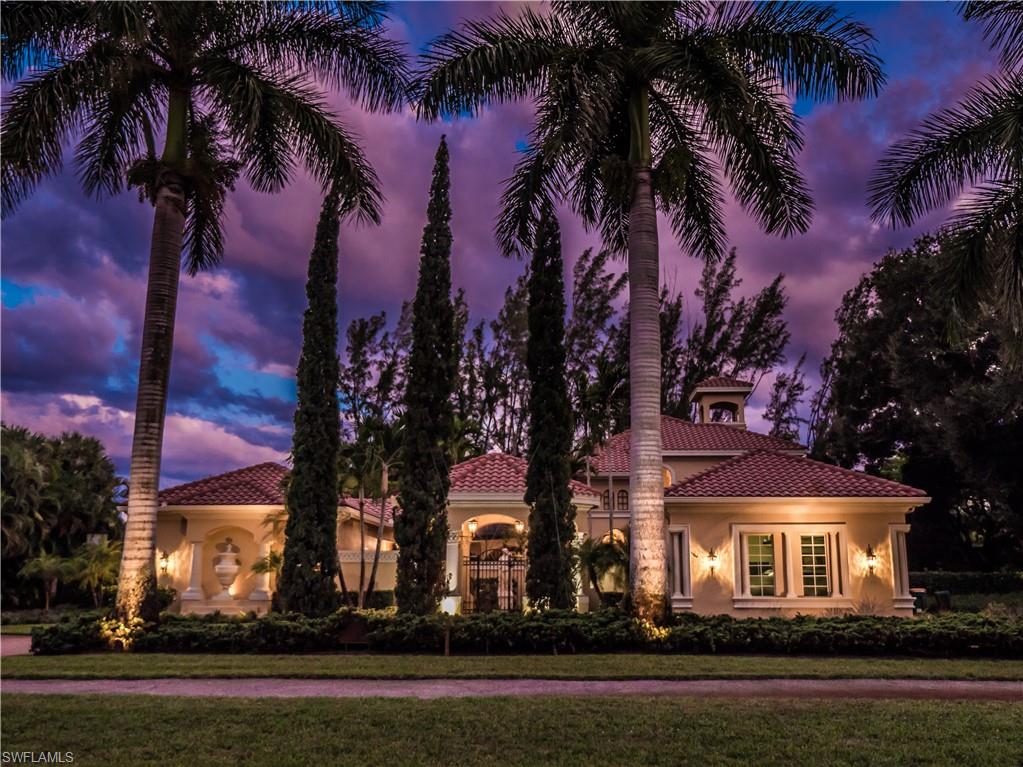 136 Hickory Road Naples, FL 34108 - Photo 33 of 34 Nighttime view