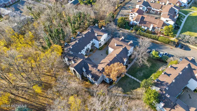 an aerial view of residential house with outdoor space