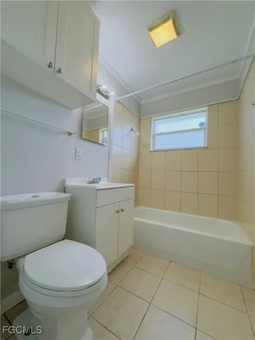 a bathroom with a sink a toilet and bathtub