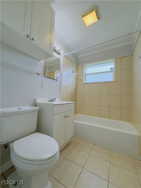 913 Hudson Avenue Lehigh Acres, FL 33936 - Photo 27 of 36 a bathroom with a sink a toilet and bathtub