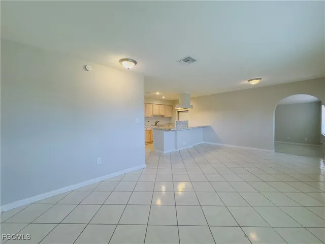 a view of a livingroom with a dishwasher and a microwave