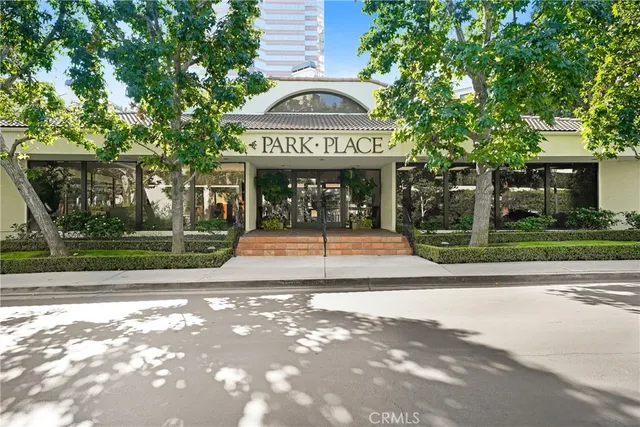 a view of a building with a yard