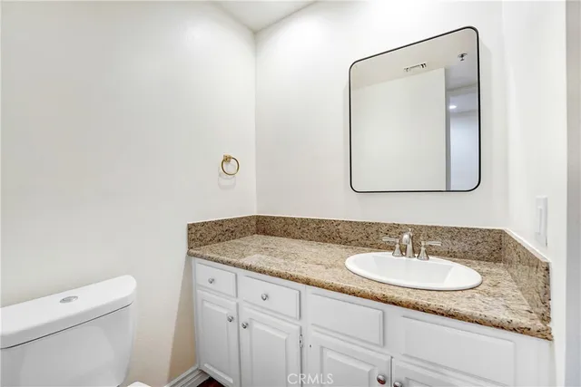 a view of an empty room with glass door