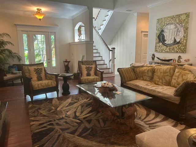 an aerial view of residential building with ocean