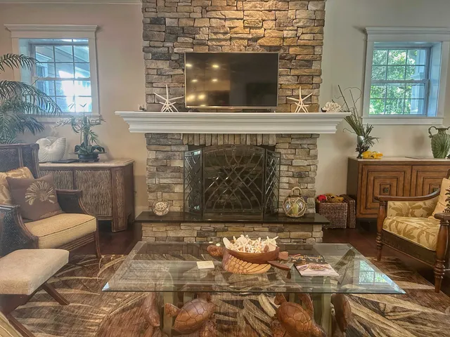 a view of walk in closet with clothes