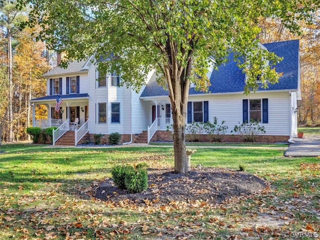 12641 2nd Branch Road Chesterfield, VA 23838 - Photo 3 of 40 a front view of a house with garden