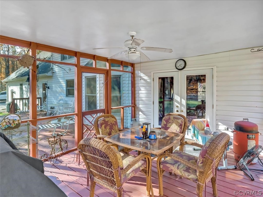 12641 2nd Branch Road Chesterfield, VA 23838 - Photo 35 of 40 a view of a dining room with furniture large windows and wooden floor