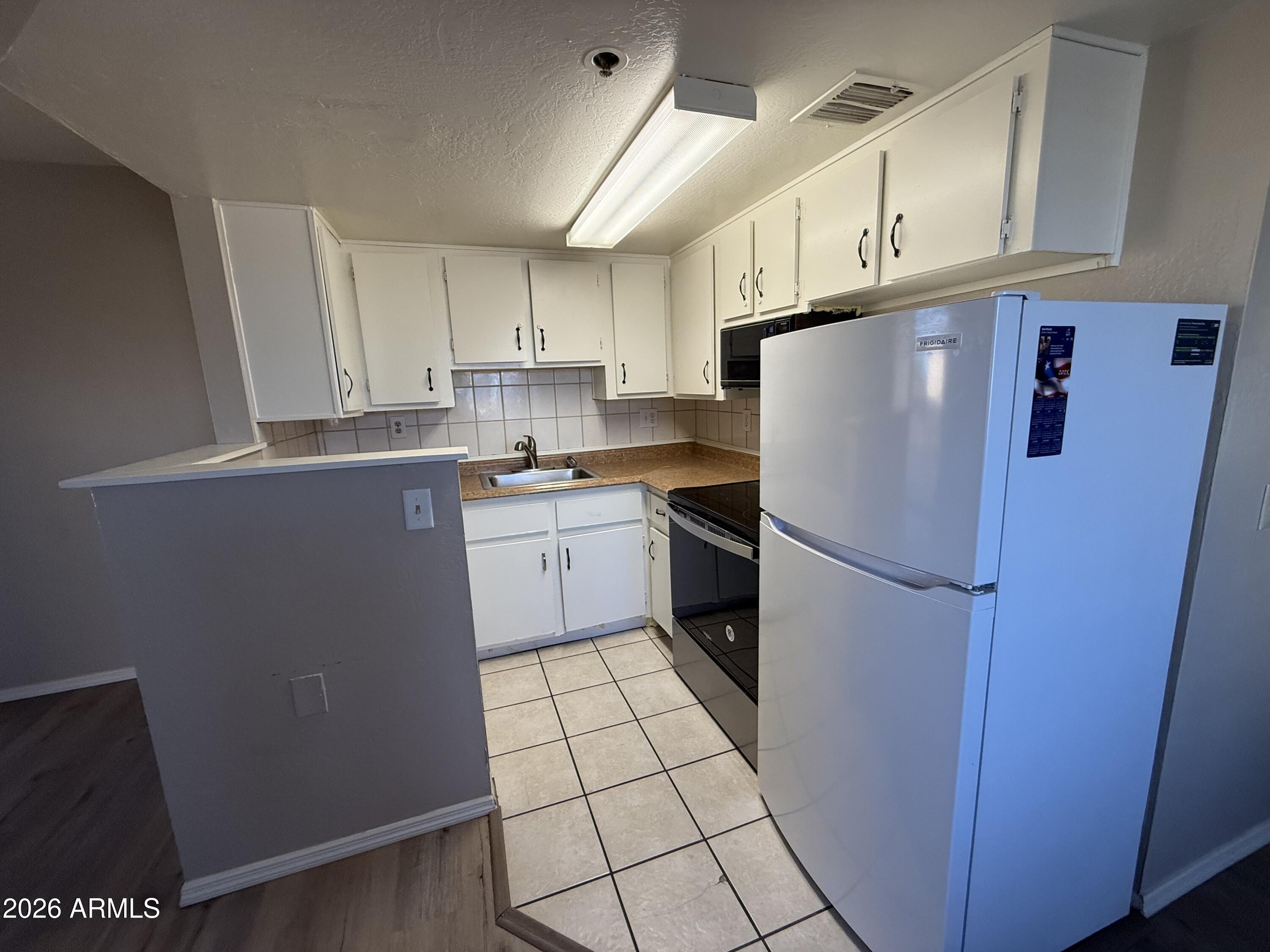 12221 West Bell Road, Unit 356 Surprise, AZ 85378 - Photo 5 of 16 IMG_0912