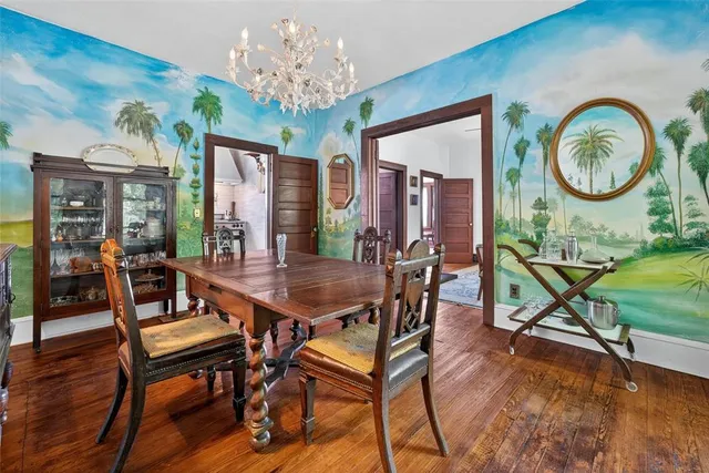 a kitchen with white cabinets and a sink