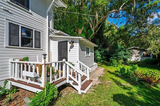 a bathroom with a sink toilet and a mirror